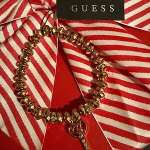 GUESS Gold Bracelet with Key Charm